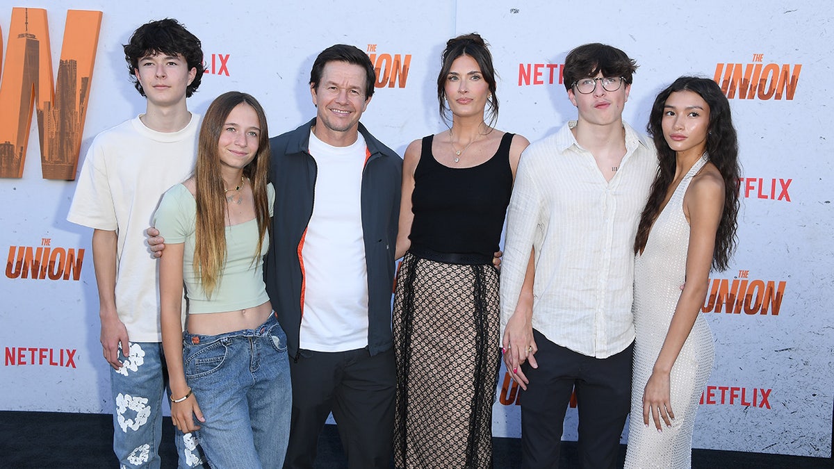 Mark Wahlberg and his wife Rhea appear on the red carpet with his son Brendan, his daughter Grace, his son Michael and his girlfriend