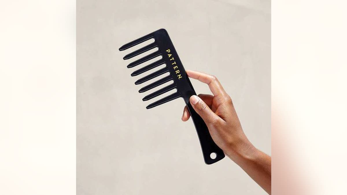 A wide tooth comb is a shower must have for thick or curly hair.