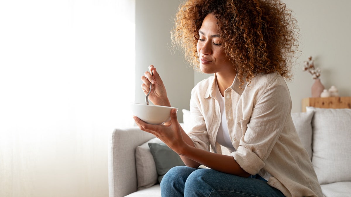 woman having breakfast