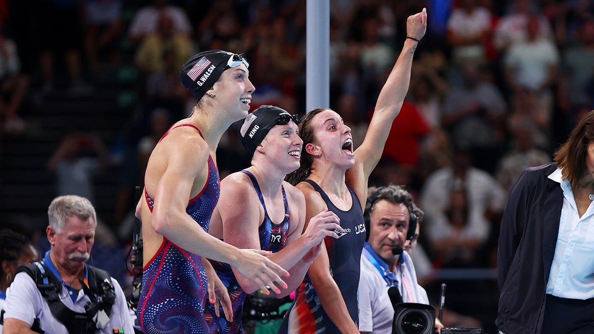 Women's medley team celebrating