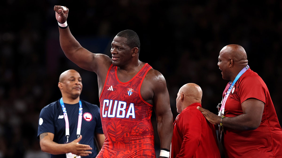 Cuban wrestler waves