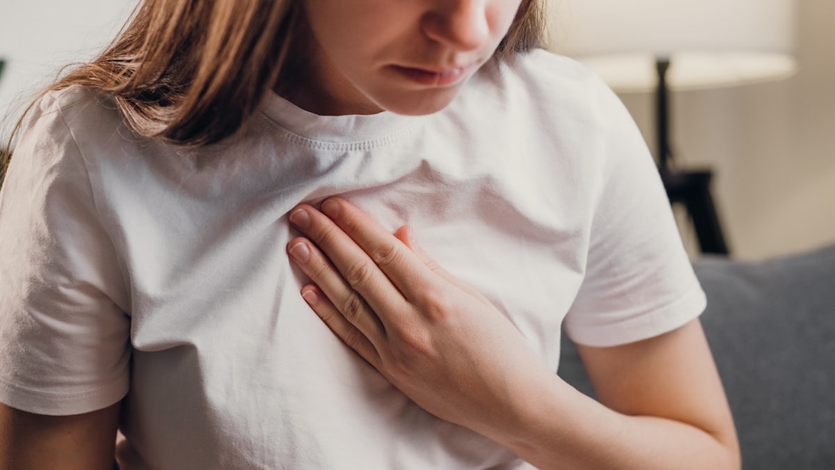 Woman with difficulty breathing