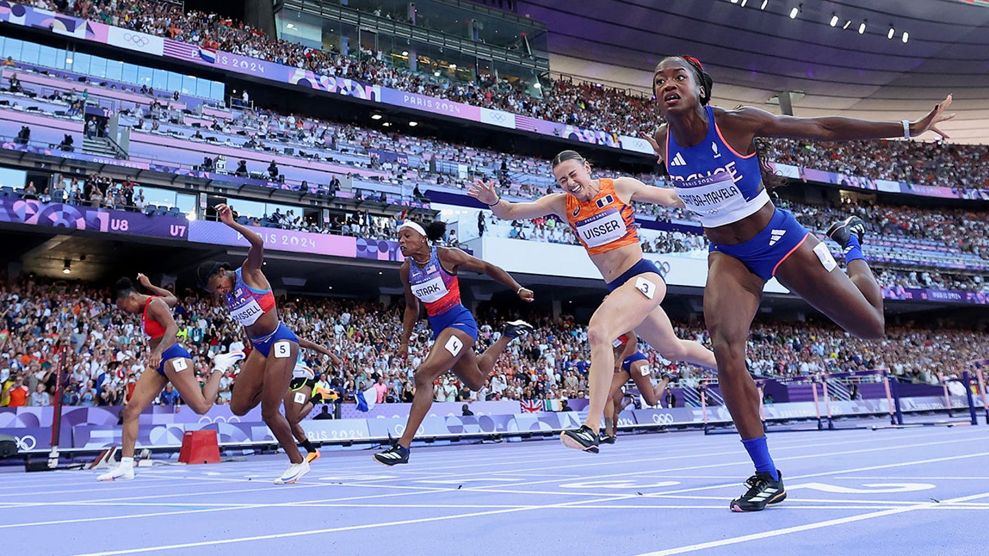 Russell Wins Gold in Thrilling 100-Meter Hurdles Finish, Defeats Samba-Mayela by a Torso