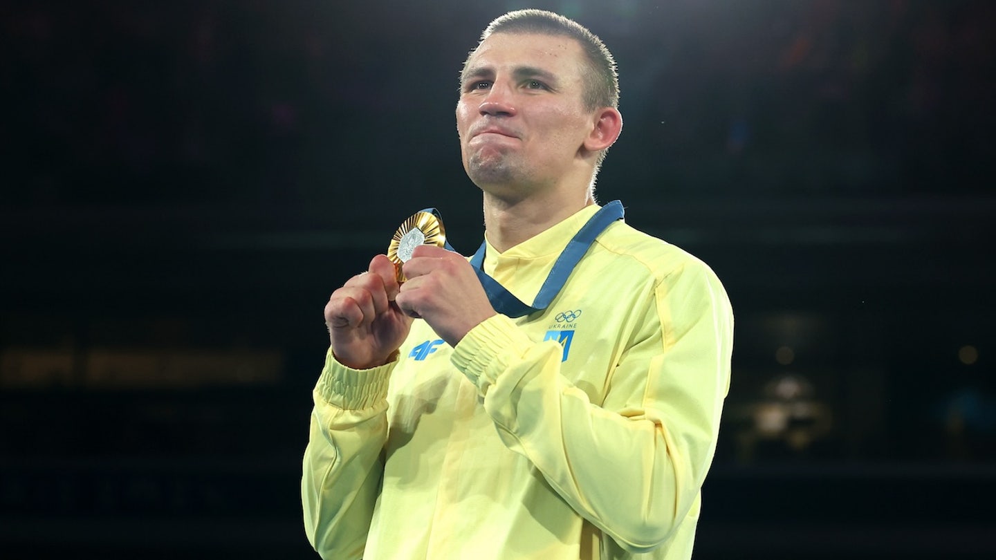 Ukrainian Boxer Khyzhniak Wins Gold, Boosting Spirits amidst Ongoing War