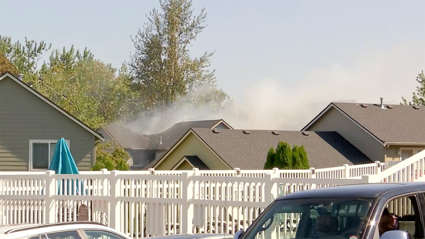 Small Plane Crashes into Townhouse in Oregon Residential Neighborhood