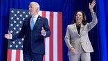 biden on stage flag