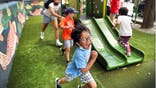 Boston, MA - July 21: Children and teacher assistants at The Kwong Kow Chinese summer school take a break from the classroom to play at a Tai Tung Park on Tyler Street in Chinatown across from the school. Despite the heat of the day, the park is in shade in the early afternoon. People in Chinatown are coping with the heat in different ways as a heat wave hits the Boston area. With its lack of trees and heat radiating off the surrounding buildings, Chinatown is one of the hotter areas in the city. (Photo by John Tlumacki/The Boston Globe via Getty Images)