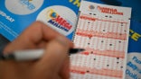 The winning numbers drawn on Tuesday were 16, 18, 21, 54 and 65 with a Mega ball of 05. The Megaplier was 2X. (Tayfun Coskun/Anadolu Agency via Getty Images)