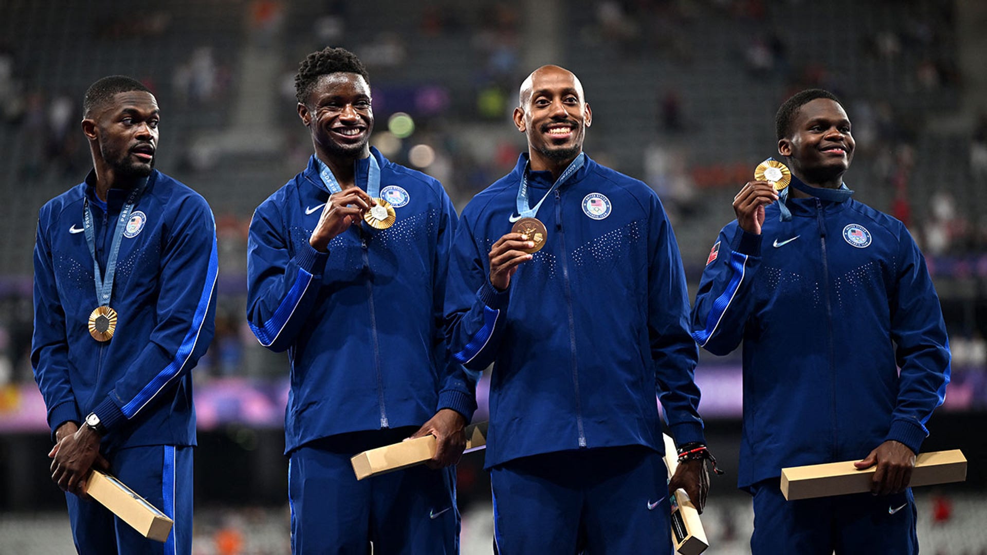 USA men's 4x400m relay team poses