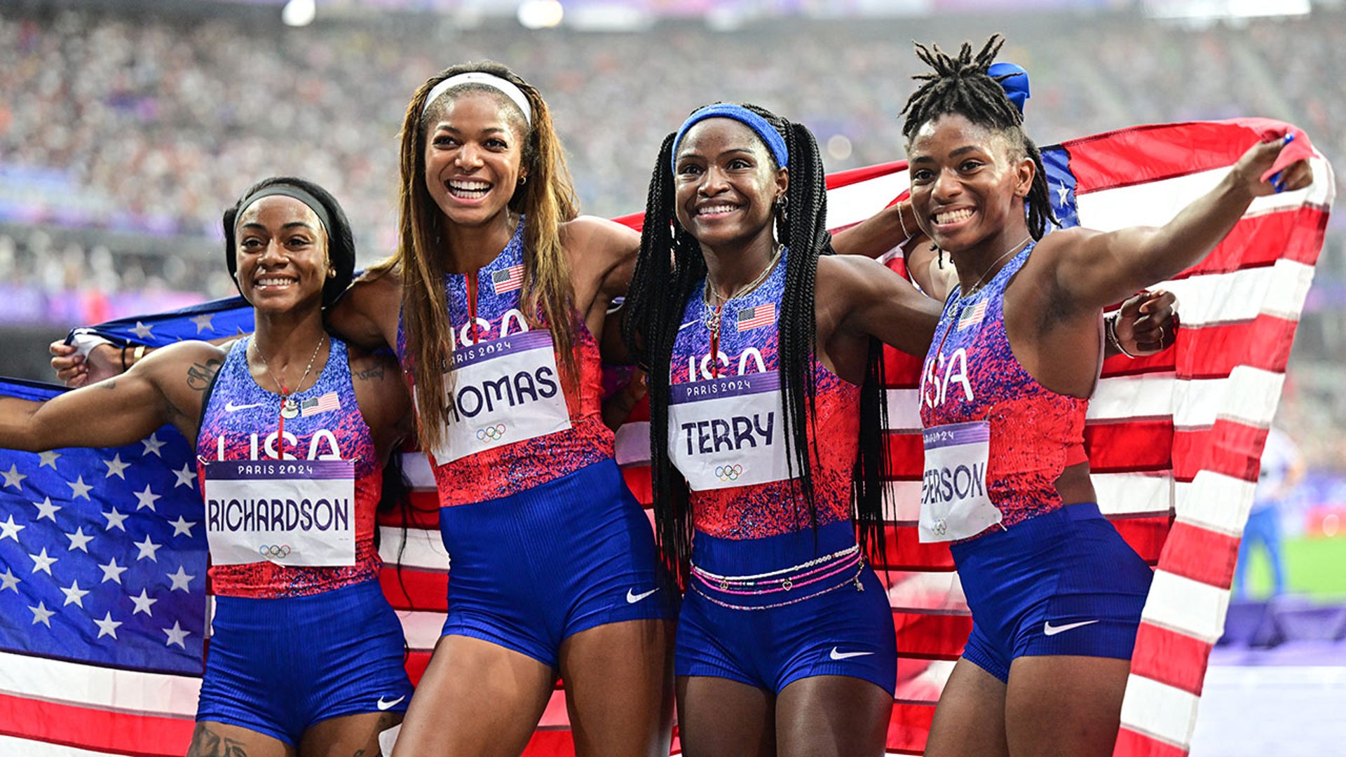 Sha'Carri Richardson, Gabrielle Thomas, Twanisha Terry, and Melissa Jefferson pose