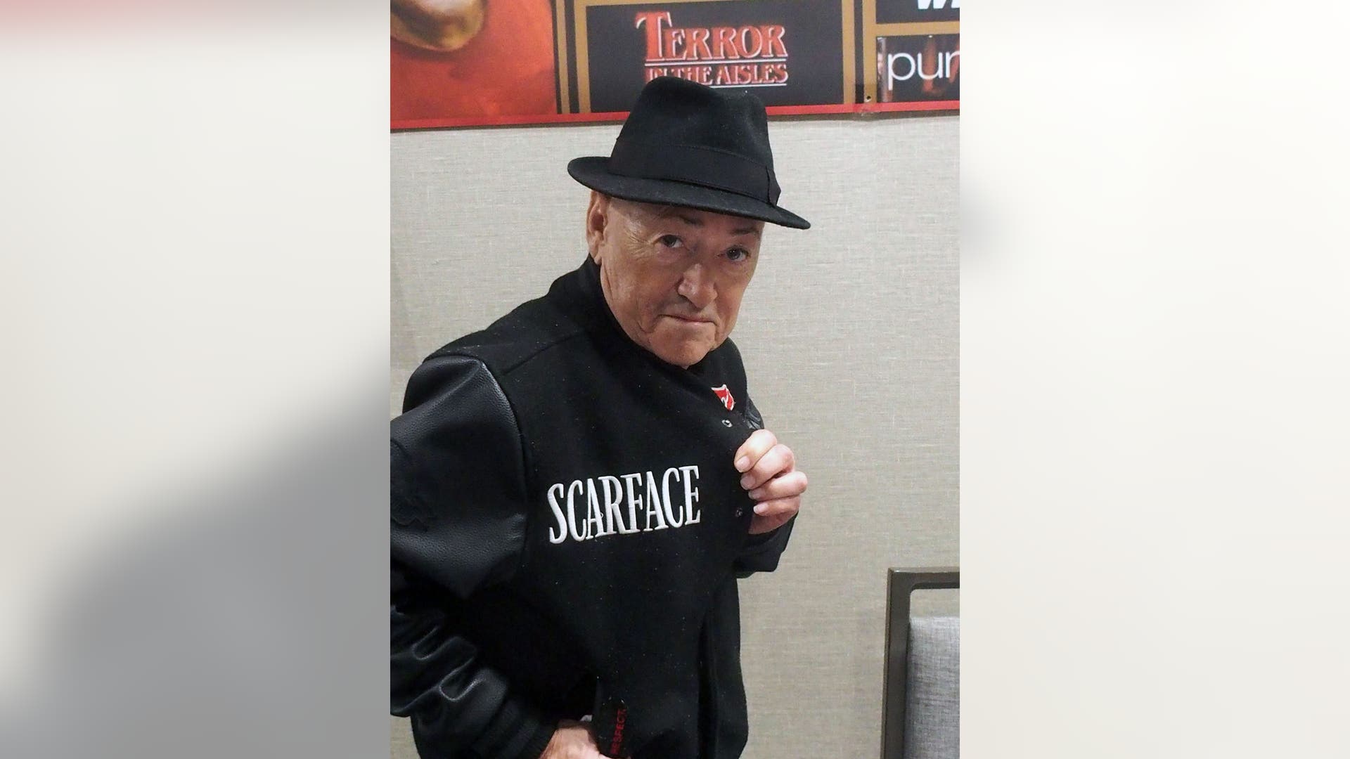 Angel Salazar wearing a Scarface jacket