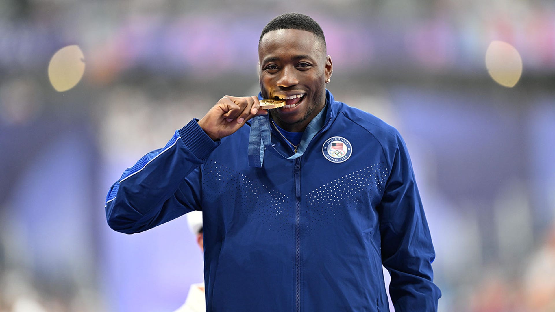 Grant Holloway poses