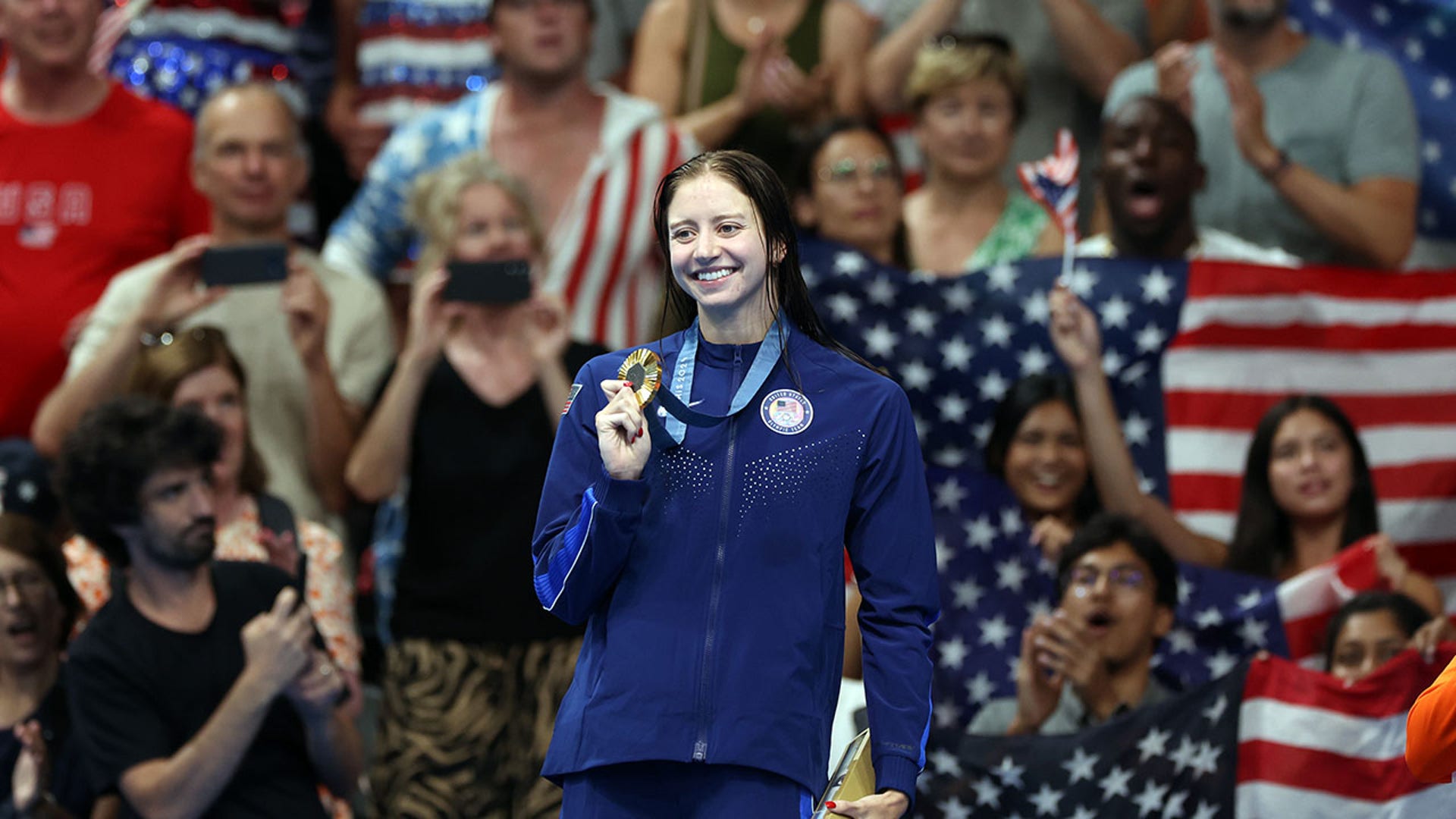 Kate Douglass with a gold