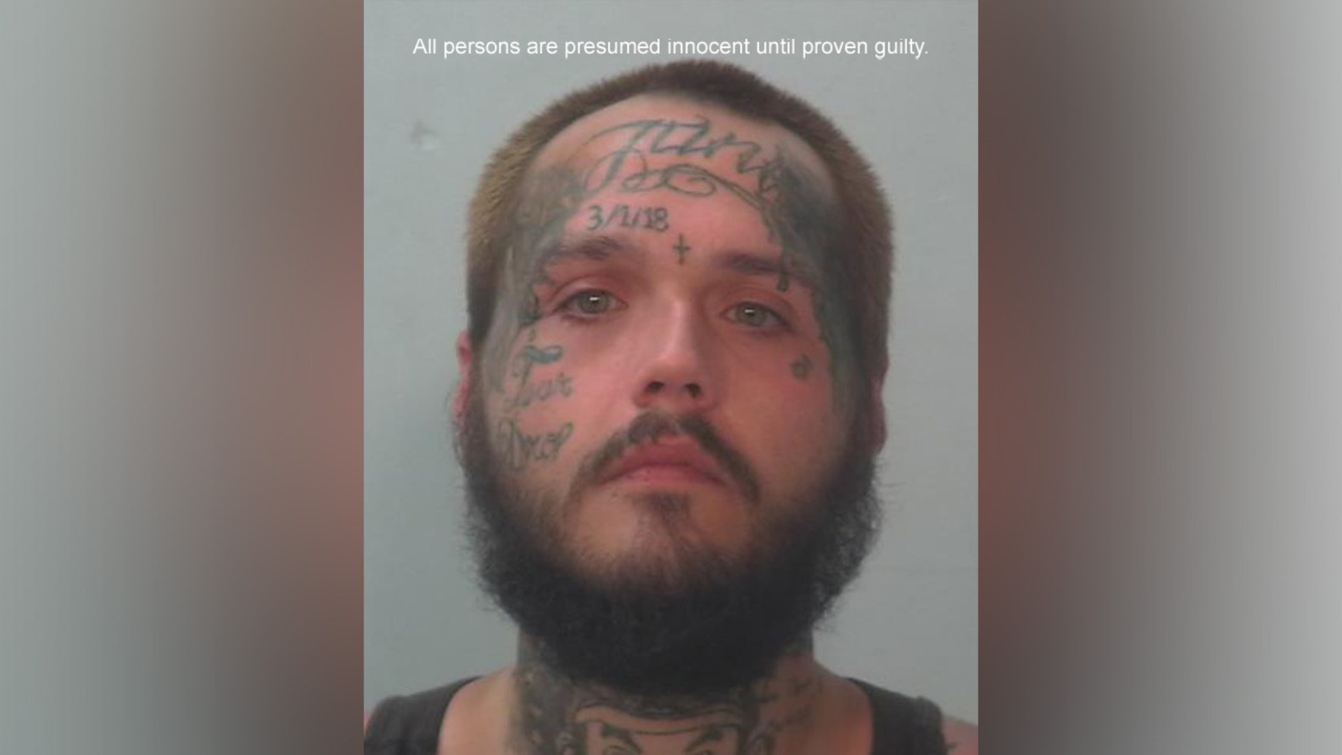 A mugshot of Shane Miller