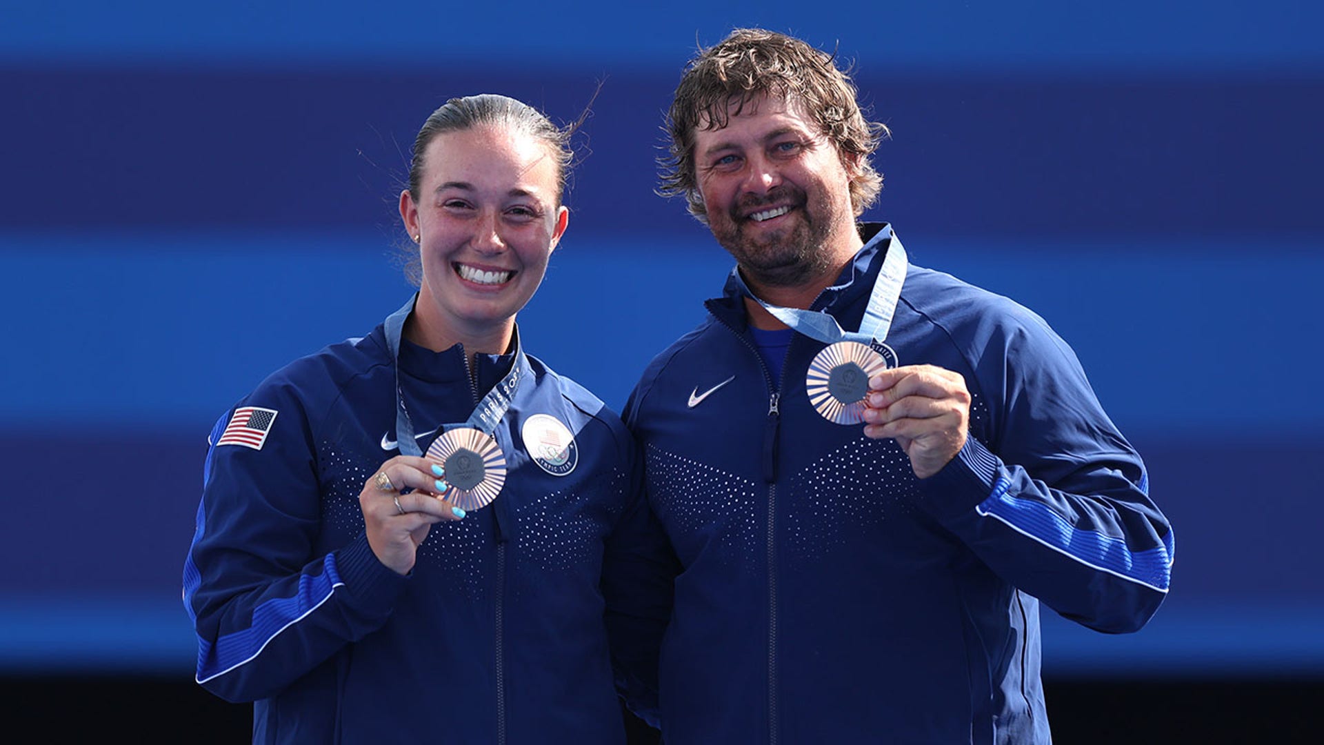 Casey Kaufhold and Brady Ellison pose