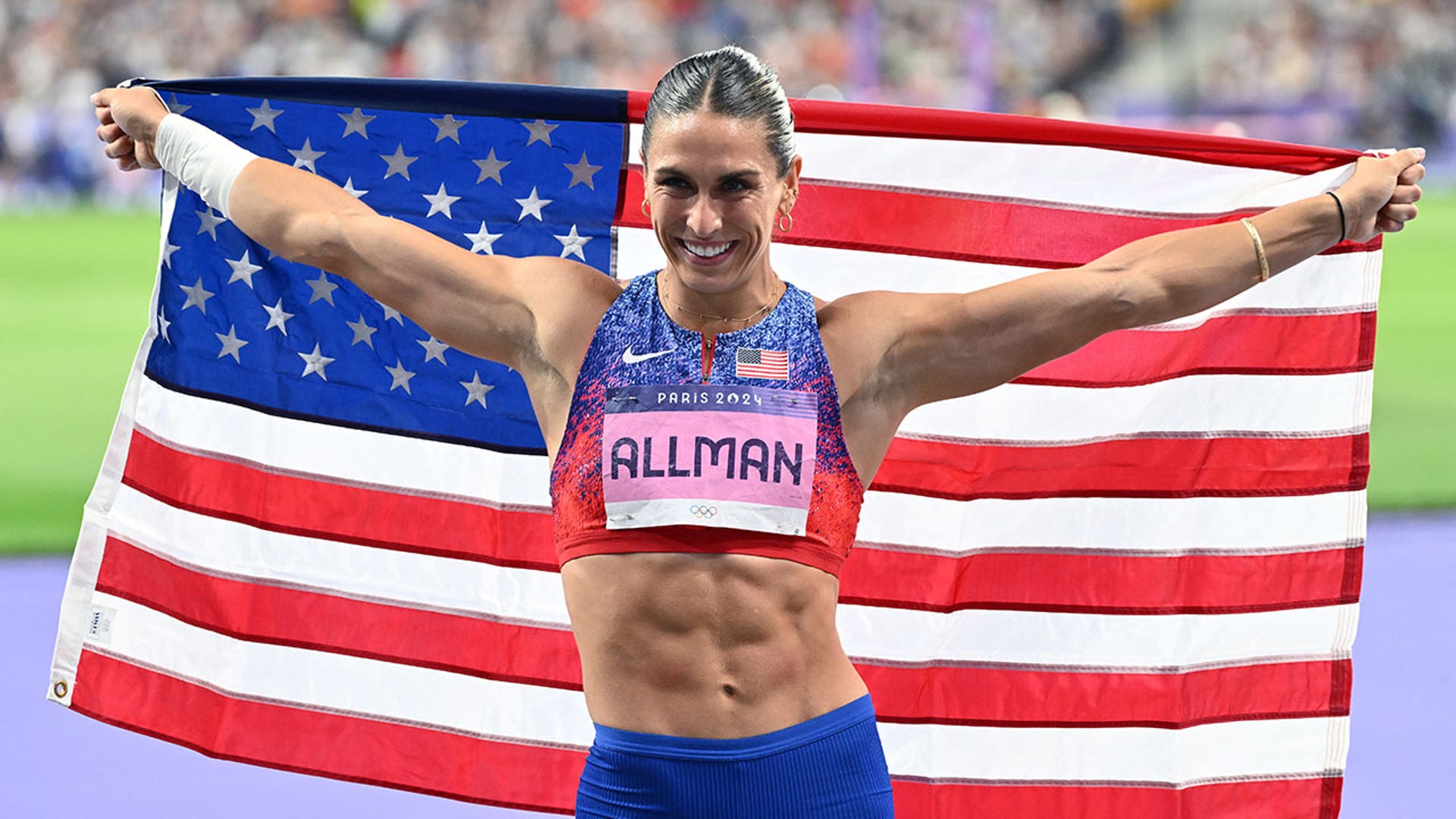 Valarie Allman with the American flag