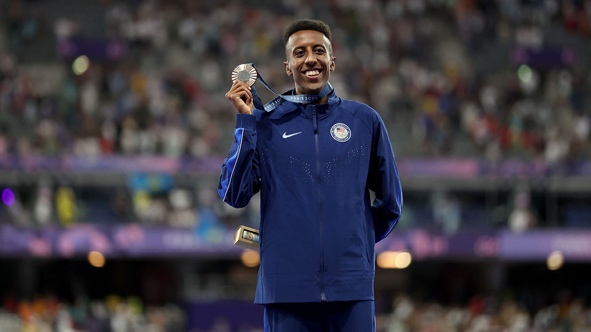 Yared Nuguse with bronze