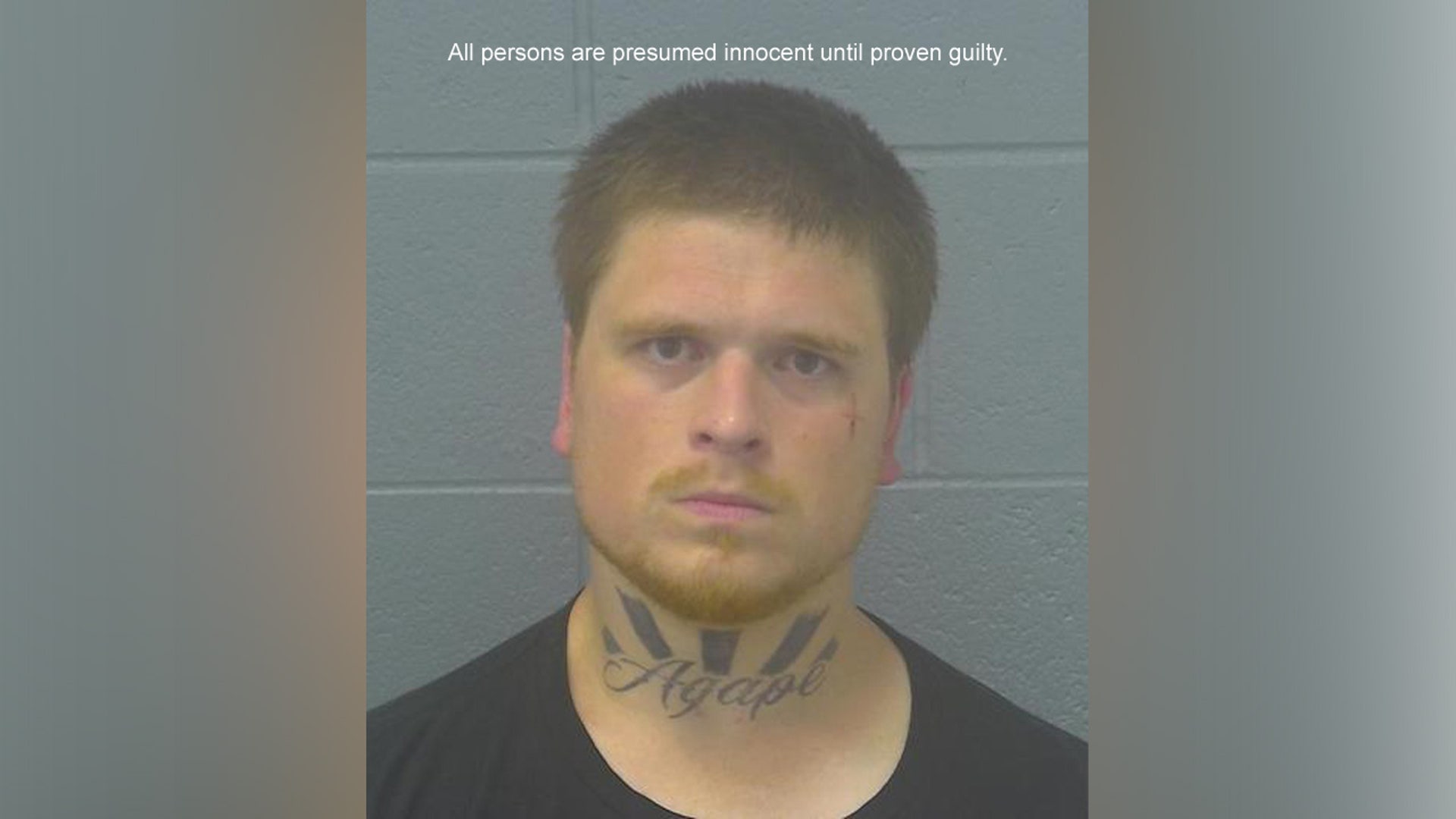 A mugshot of Logan Woodring