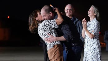 Moment of Triumph: Americans Freed from Russia Return Home to Joyful Welcome