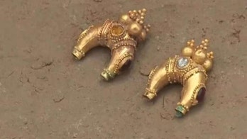 Ancient Artifacts Unearthed in Kazakhstan Burial Mound