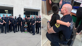 Texas police escort late officer's son to first day of school