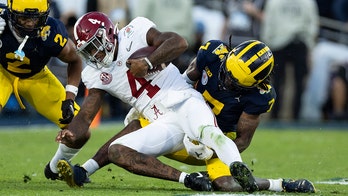 Michigan's Sign-Stealing Controversy: Alabama Quarterback Milroe Defends Wolverines' Win