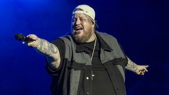 Jelly Roll halts concert to help cancer survivor with 'full-blown IV'