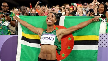 Navy Football Player's Joyous Celebration as Sister Wins Olympic Gold in Triple Jump