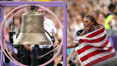 Gabby Thomas Soars to Olympic Gold with Flag-Waving Celebration