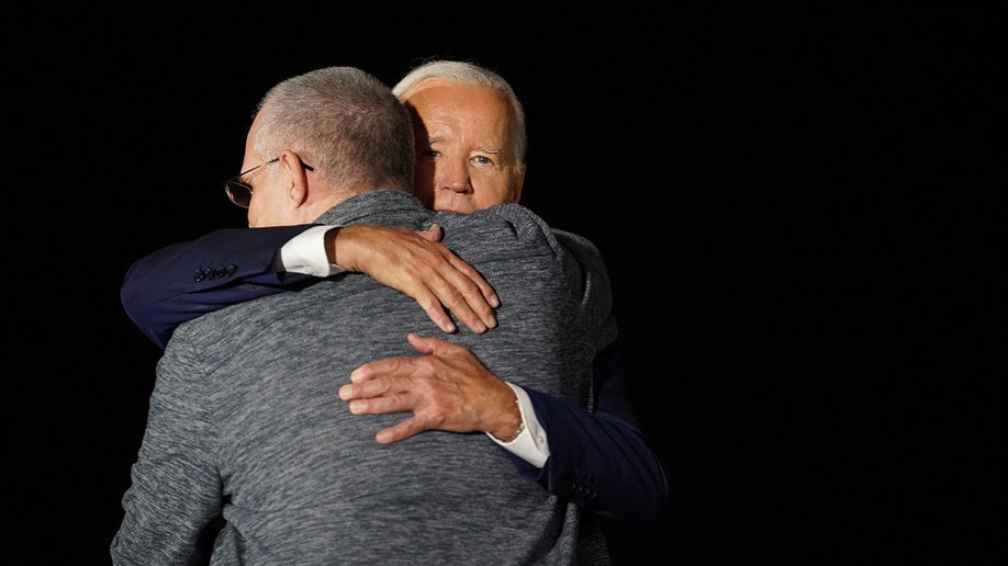 President Joe Biden embraces Paul Whelan