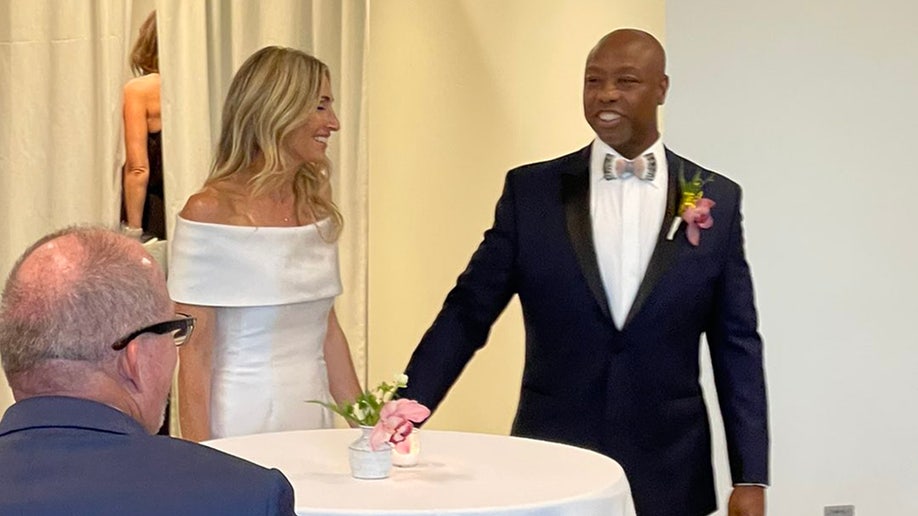 Tim Scott smiles at his bride, Mindy Noce