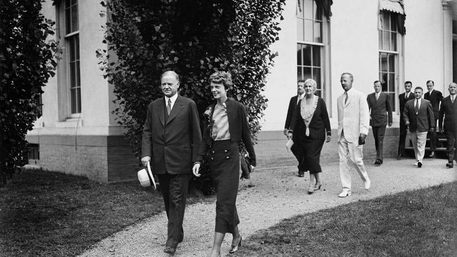 Herbert Hoover at White House with Amelia Earhart