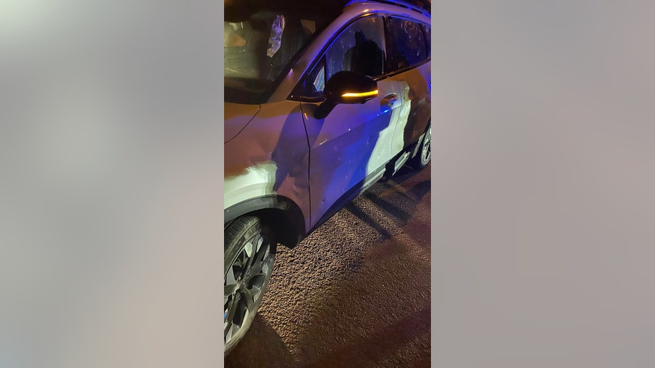 White SUV hit by IED in Hawaii front side view