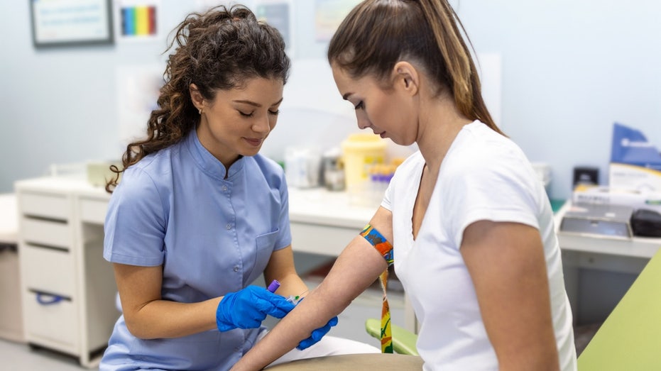 A woman donating blood