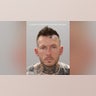 A mugshot of Adam Hounschell