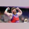 Ryan Crouser reacts