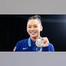 Suni Lee with the bronze