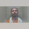 A mugshot of Phillip Latham
