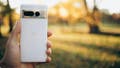 A person holding a Google Pixel smartphone - Fox News