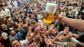 Festival goer reach out for the first glasses of beer on day one of the 189th Oktoberfest beer festival in Munich, Germany, Saturday, Sept. 21, 2024. - Fox News