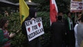 One protester at the rally was seen holding a sign supporting the Hezbollah terror group. - Fox News
