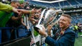 November 10, 2019; Seattle, WA, USA; Recording artist Macklemore carries the trophy after the MLS Cup between the Seattle Sounders and the Toronto FC at CenturyLink Field. - Fox News