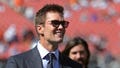 NFL legend Tom Brady is all smiles before an NFL football game at Huntington Bank Field, Sunday, Sept. 8, 2024, in Cleveland, Ohio. - Fox News
