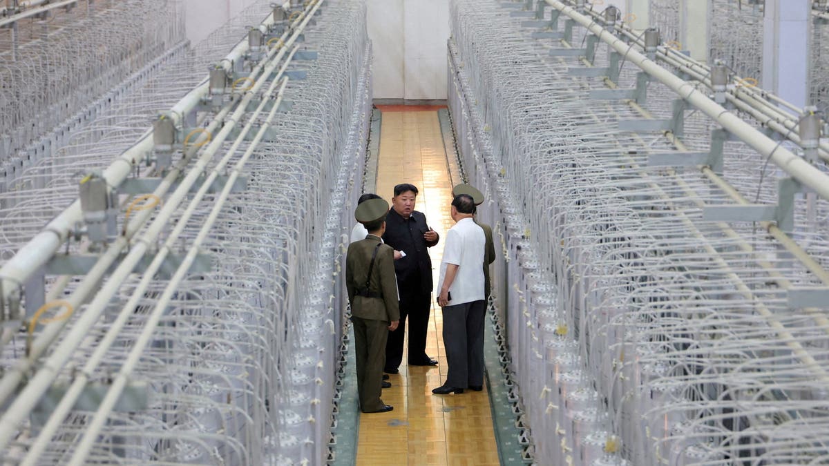 North Korean leader Kim Jong Un tours facilities during a visit to the Nuclear Weapons Institute and the production base of weapon-grade nuclear materials at an undisclosed location in North Korea, in this photo released by North Korea's official Korean Central News Agency, September 13, 2024.     