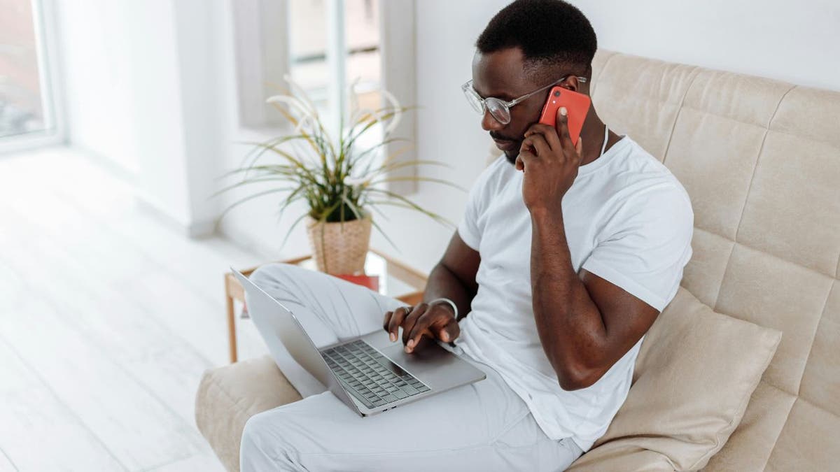 Man sitting with phone