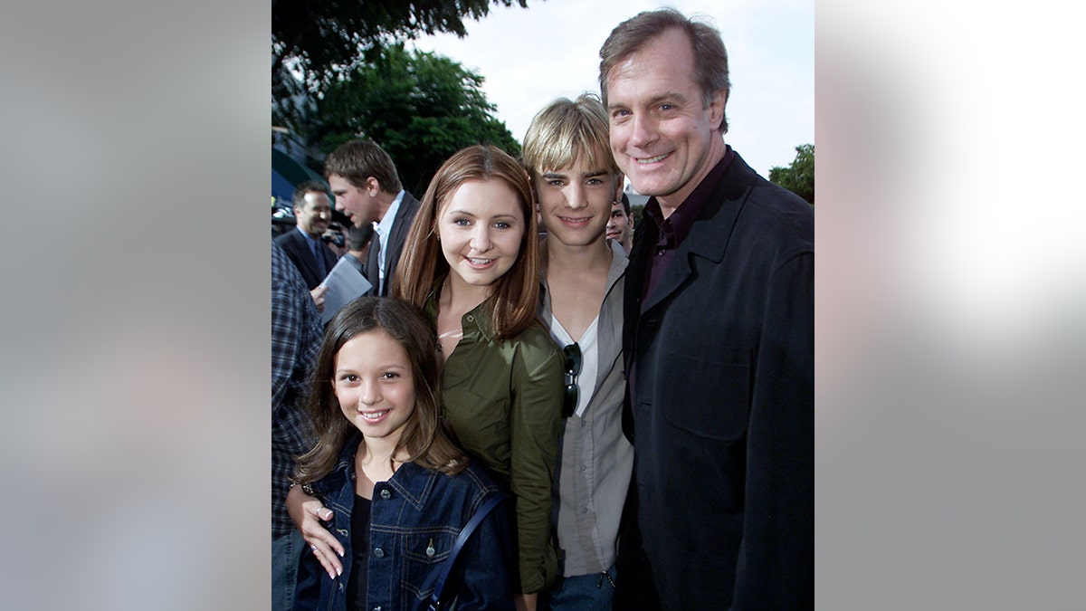 Mackenzie Rosman, Beverley Mitchell, Matt Gallagher and Stephen Collins pose for a photo together at the premiere of Summer Catch in 2001