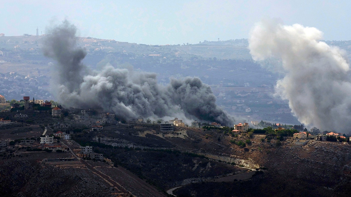 Smoke rises from Israeli air strikes