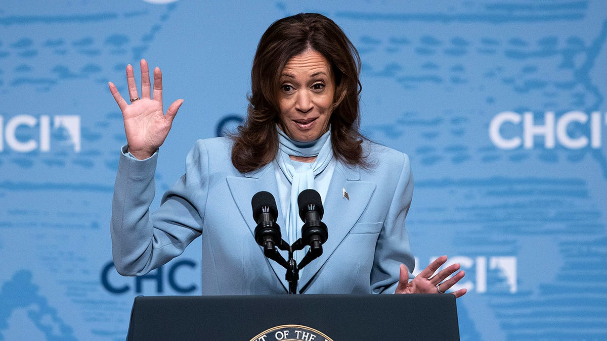 Harris on stage at a Hispanic caucus event