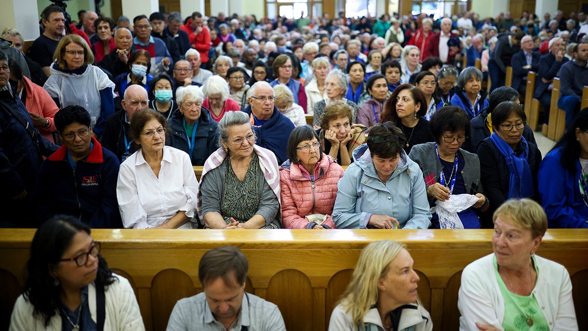 A diverse group of people in a church.