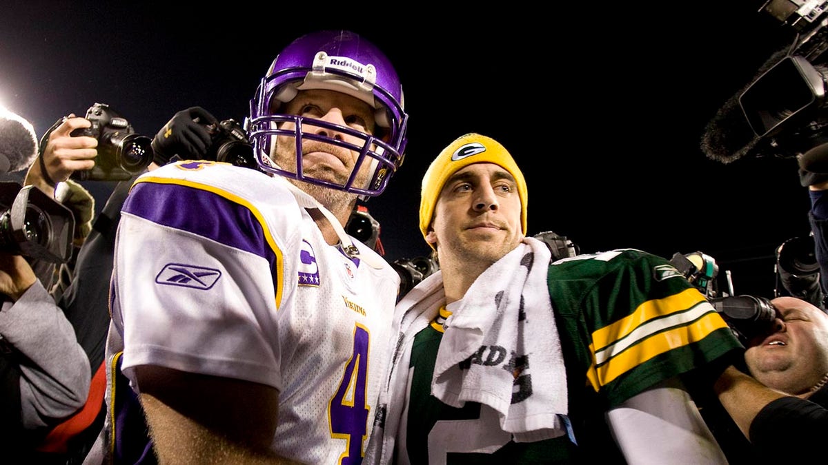 Brett Favre greets Aaron Rodgers